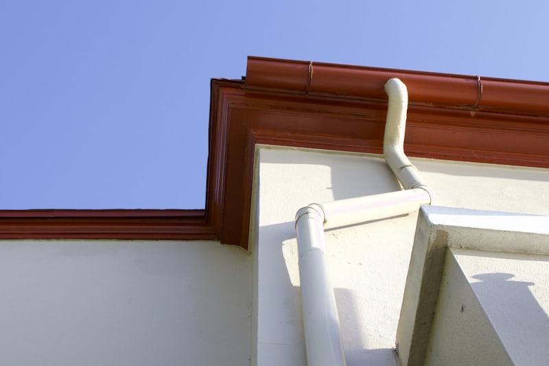 Close-up of a home's gutter and downspout system